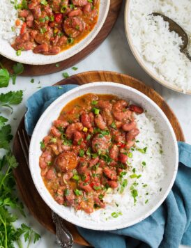 two servings of red beans and rice in bowls