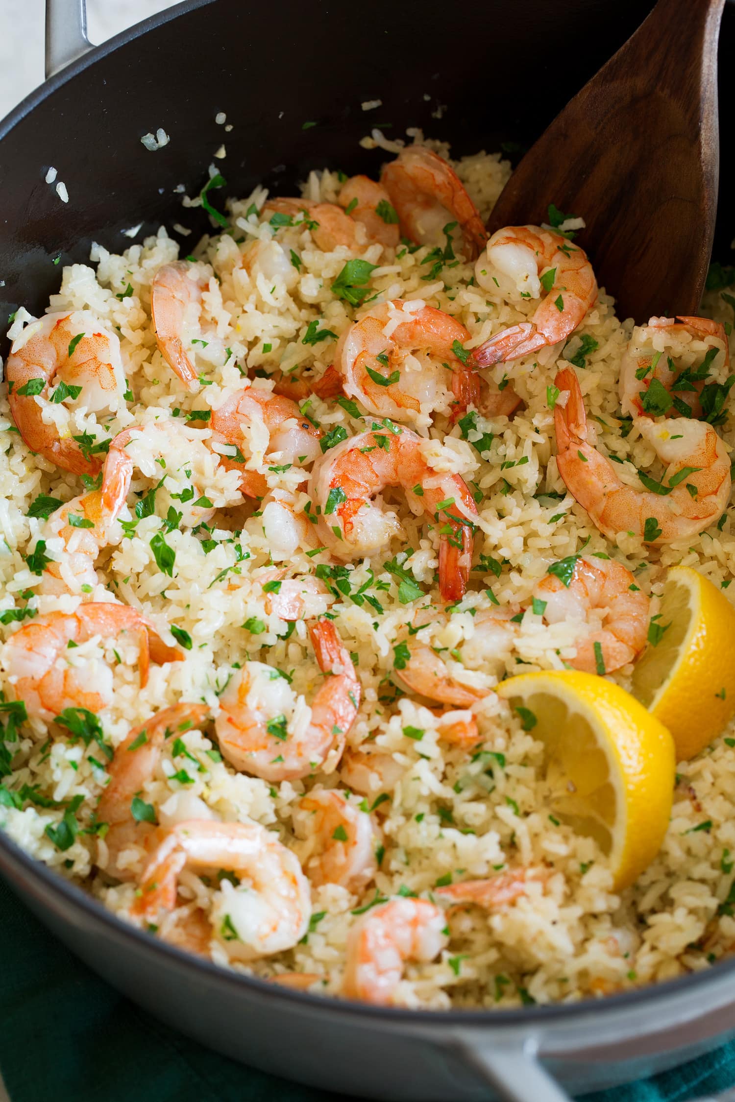 Shrimp and rice shown in a large pot.
